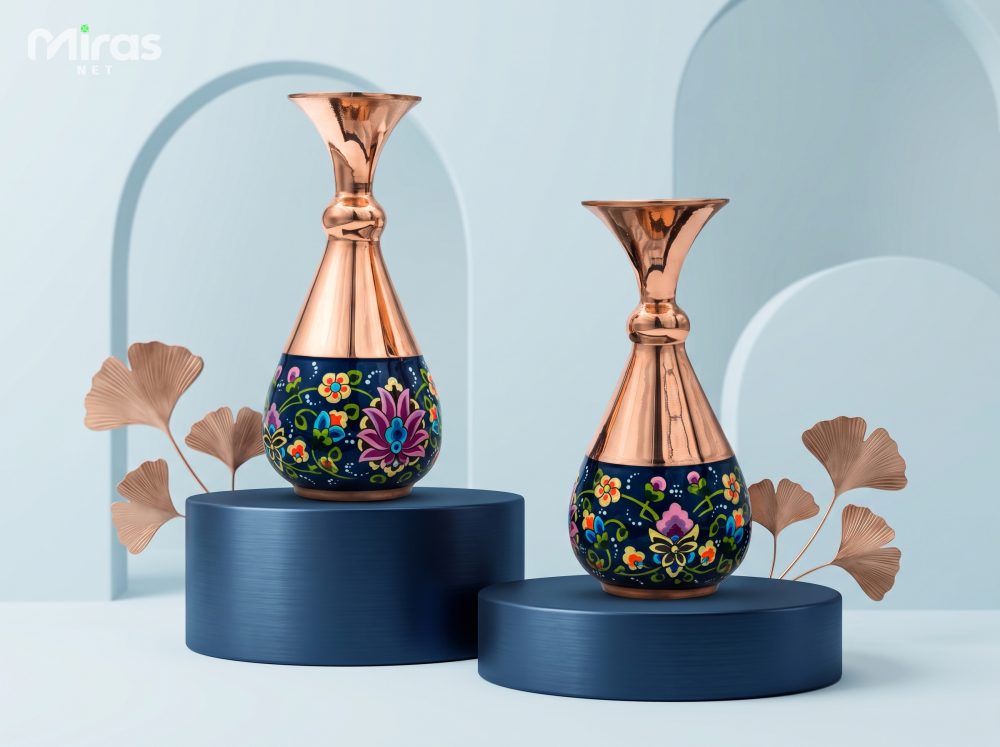 A pair of enamelled copper vases in floral mina-kari